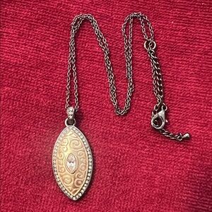 Elegant Silver and Gold Pendant Necklace